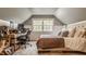 Bedroom featuring a bed, desk and window with natural light, creating a functional space at 8770 N Pennsylvania St, Indianapolis, IN 46240