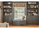 Charming window seat is surrounded by lots of storage space and natural light at 8770 N Pennsylvania St, Indianapolis, IN 46240