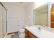 Bathroom featuring a tub and shower combination and vanity sink with a mirror at 897 N Scott Dr, Greenwood, IN 46142