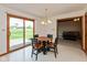 Bright breakfast area with backyard view and access to kitchen and living area at 897 N Scott Dr, Greenwood, IN 46142
