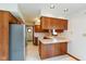 Functional kitchen with wood cabinetry and ample counter space at 897 N Scott Dr, Greenwood, IN 46142