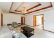 Spacious living area with coffered ceilings and access to other rooms in the house at 897 N Scott Dr, Greenwood, IN 46142