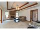 Inviting living room with brick fireplace, coffered ceiling, and ample natural light at 897 N Scott Dr, Greenwood, IN 46142
