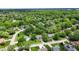Drone shot featuring the neighborhood, showcasing tree-lined streets and community at 9832 Scotch Pine Ln, Indianapolis, IN 46256