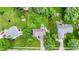 Aerial view of the property showcasing the home, backyard, and landscaping at 9832 Scotch Pine Ln, Indianapolis, IN 46256