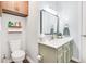 Bathroom featuring fresh fixtures, a stylish vanity, and ample lighting, blending style and functionality at 9832 Scotch Pine Ln, Indianapolis, IN 46256