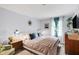 Bright bedroom with a comfortable bed, stylish decor, and plenty of natural light creates a relaxing retreat at 9832 Scotch Pine Ln, Indianapolis, IN 46256