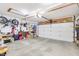 Spacious two car garage with overhead lighting and garage door at 9832 Scotch Pine Ln, Indianapolis, IN 46256