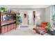 Inviting view of a living room showing the entry hallway and staircase that accents the bright and airy space at 9832 Scotch Pine Ln, Indianapolis, IN 46256