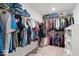 Spacious walk-in closet with an abundance of hanging storage and shelving at 10419 Pronghorn Ln, Indianapolis, IN 46239