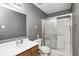 Bathroom features neutral colors, and a glass door shower at 10763 Zimmerman Ln, Indianapolis, IN 46231