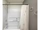 Standard bathtub and shower combo with neutral colored shower curtain at 10763 Zimmerman Ln, Indianapolis, IN 46231