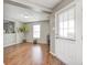 Bright living room featuring hardwood floors, neutral paint, and lots of natural light at 10763 Zimmerman Ln, Indianapolis, IN 46231