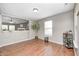 Bright living room featuring hardwood floors, neutral paint, and lots of natural light at 10763 Zimmerman Ln, Indianapolis, IN 46231