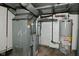 Basement utility area with furnace and water heater at 122 E 27Th St, Indianapolis, IN 46205