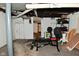 Unfinished basement featuring some gym equipment and block wall at 122 E 27Th St, Indianapolis, IN 46205