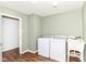 This laundry room has a washer, dryer, and sink at 12612 Majestic Way, Fishers, IN 46037