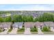 Aerial perspective of a residential neighborhood featuring houses with large yards and mature trees at 1274 Timber Bluff Rd, Westfield, IN 46074