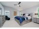 Bedroom features a bed with built-in storage, a ceiling fan, and gray decor at 1274 Timber Bluff Rd, Westfield, IN 46074