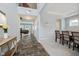 Open-concept entryway leads to dining area with carpet, and a spacious living room at 1274 Timber Bluff Rd, Westfield, IN 46074