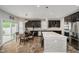 Open concept kitchen with stainless steel appliances, granite countertops, and a center island at 1274 Timber Bluff Rd, Westfield, IN 46074