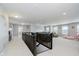 Open loft area with a staircase, railing, and ample space for seating and entertainment at 1274 Timber Bluff Rd, Westfield, IN 46074