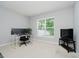 Bright home office with large window, neutral walls, and an ergonomic workstation at 1274 Timber Bluff Rd, Westfield, IN 46074