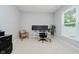 Bright home office with large window, neutral walls, and an ergonomic workstation at 1274 Timber Bluff Rd, Westfield, IN 46074