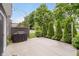 Cozy patio area with a grill, decorative plants, string lights, and privacy screen at 1274 Timber Bluff Rd, Westfield, IN 46074