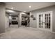 Finished basement featuring neutral walls, carpeted floors, access to staircase, and recessed lighting at 14805 Chamberlain Dr, Westfield, IN 46074
