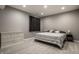 Finished basement bedroom features neutral walls, carpeted floors, and a blackout curtain at 14805 Chamberlain Dr, Westfield, IN 46074