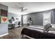 Spacious bedroom setup as a combination bedroom and study area with two desks, hardwood flooring and ample light at 14805 Chamberlain Dr, Westfield, IN 46074