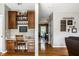 Cozy home office area with desk, cabinets, and hardwood floors at 14805 Chamberlain Dr, Westfield, IN 46074