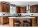 Updated kitchen featuring granite countertops, tiled backsplash, and stainless steel appliances at 14805 Chamberlain Dr, Westfield, IN 46074