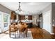 Spacious kitchen with hardwood floors, stainless steel appliances, and custom wood cabinets at 14805 Chamberlain Dr, Westfield, IN 46074