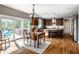 Eat-in kitchen with wooden table, stainless steel appliances, and lots of sunlight at 14805 Chamberlain Dr, Westfield, IN 46074