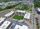Aerial view of community showing apartment buildings with green spaces and surrounding roads at 15 W Executive Dr # 101, Carmel, IN 46032
