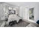 Inviting bedroom with modern decor, ambient lighting, and a serene atmosphere at 15 W Executive Dr # 101, Carmel, IN 46032