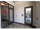 Entrance to the fitness center features a glass door and access control system at 15 W Executive Dr # 101, Carmel, IN 46032