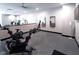 Features treadmills, stationary bikes, and wall mounted monitors in the resident gym at 15 W Executive Dr # 101, Carmel, IN 46032