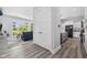 Modern interior with hardwood floors leading to living room and kitchen at 15 W Executive Dr # 101, Carmel, IN 46032