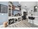 Charming kitchen with custom wine storage, stainless appliances, and modern finishes at 15 W Executive Dr # 101, Carmel, IN 46032