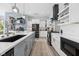 Spacious kitchen featuring an island, modern appliances, and open-concept design at 15 W Executive Dr # 101, Carmel, IN 46032