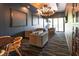 Stylish lounge area with modern lighting, comfortable seating, and sleek dark blue walls at 15 W Executive Dr # 101, Carmel, IN 46032