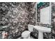 Beautiful powder room with designer wallpaper, pedestal sink, and modern fixtures at 15 W Executive Dr # 101, Carmel, IN 46032