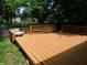 Spacious wooden deck with railing, perfect for outdoor relaxation and entertaining at 1612 Prairieview Ln, Greenfield, IN 46140