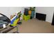 Spare room featuring golf equipment, yeti cooler, boxes, and a television at 1612 Prairieview Ln, Greenfield, IN 46140