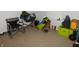 Spare room featuring chairs, golf equipment, yeti cooler and other items at 1612 Prairieview Ln, Greenfield, IN 46140