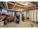 Unfinished basement with exposed ductwork, concrete floors, and visible brick foundation at 1616 N Delaware St, Indianapolis, IN 46202