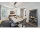 Formal dining room with seating for eight, stylish chandelier, and a large mirror at 1616 N Delaware St, Indianapolis, IN 46202